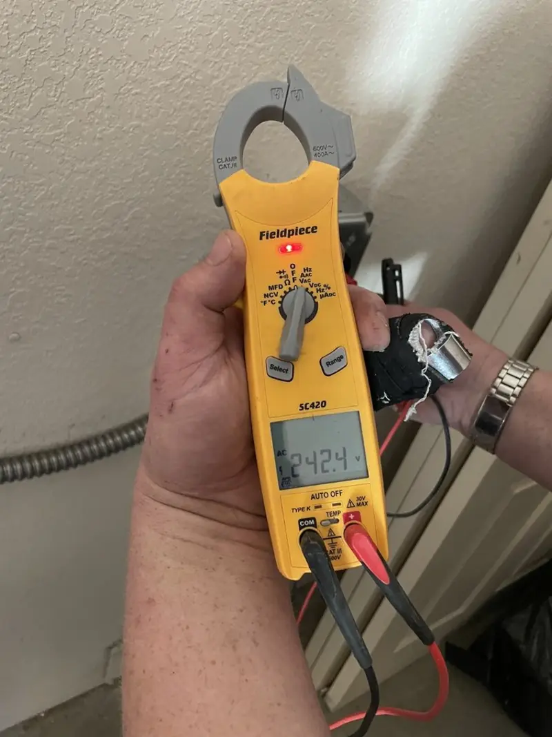 Voltage testing with clamp meter during Aluminum Wiring Replacement in Lake Morton-Berrydale
